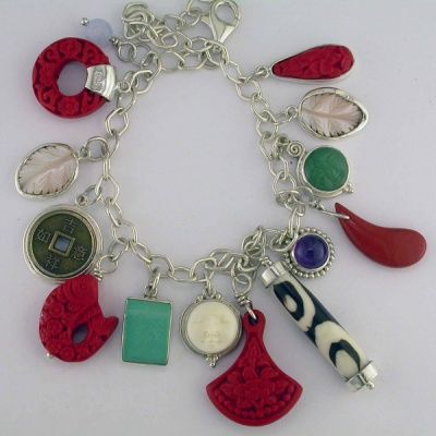 Sterling Silver Cinnabar, Mudbead and Shell Charm Bracelet with Multiple Charms