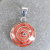 Orange Spiny Oyster Shell "Pachamama" Pendant with Tibetan Dorje 1.25"